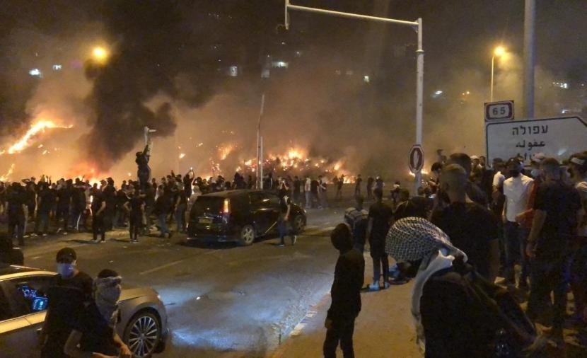 تقرير بريطاني يستعرض أبرز ما يتعرض له الفلسطينيون بأراضي48